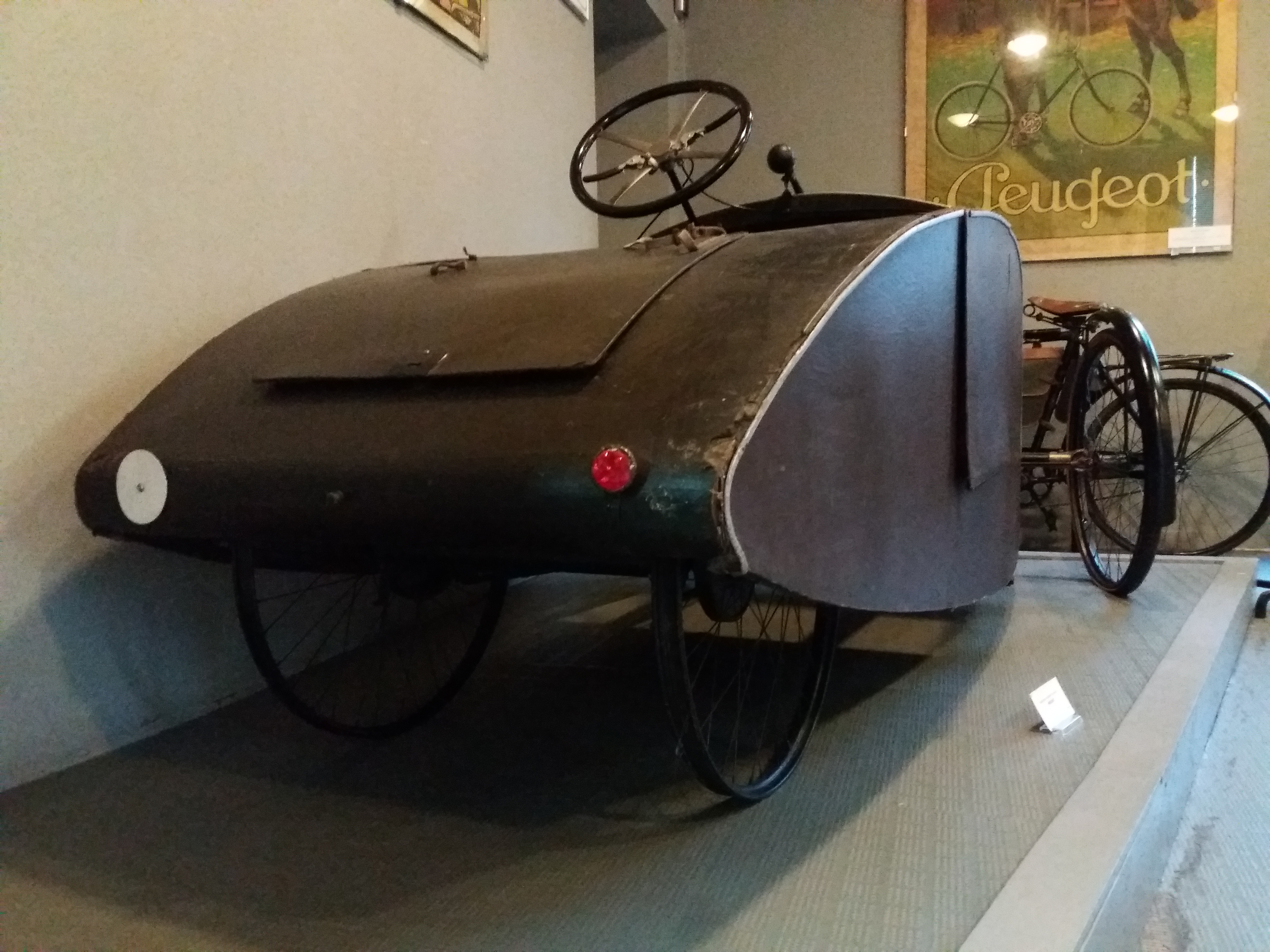 A Mochet Vélocar pedal quadricycle at the Musée Barthélemy Thimonnier in Amplepuis.