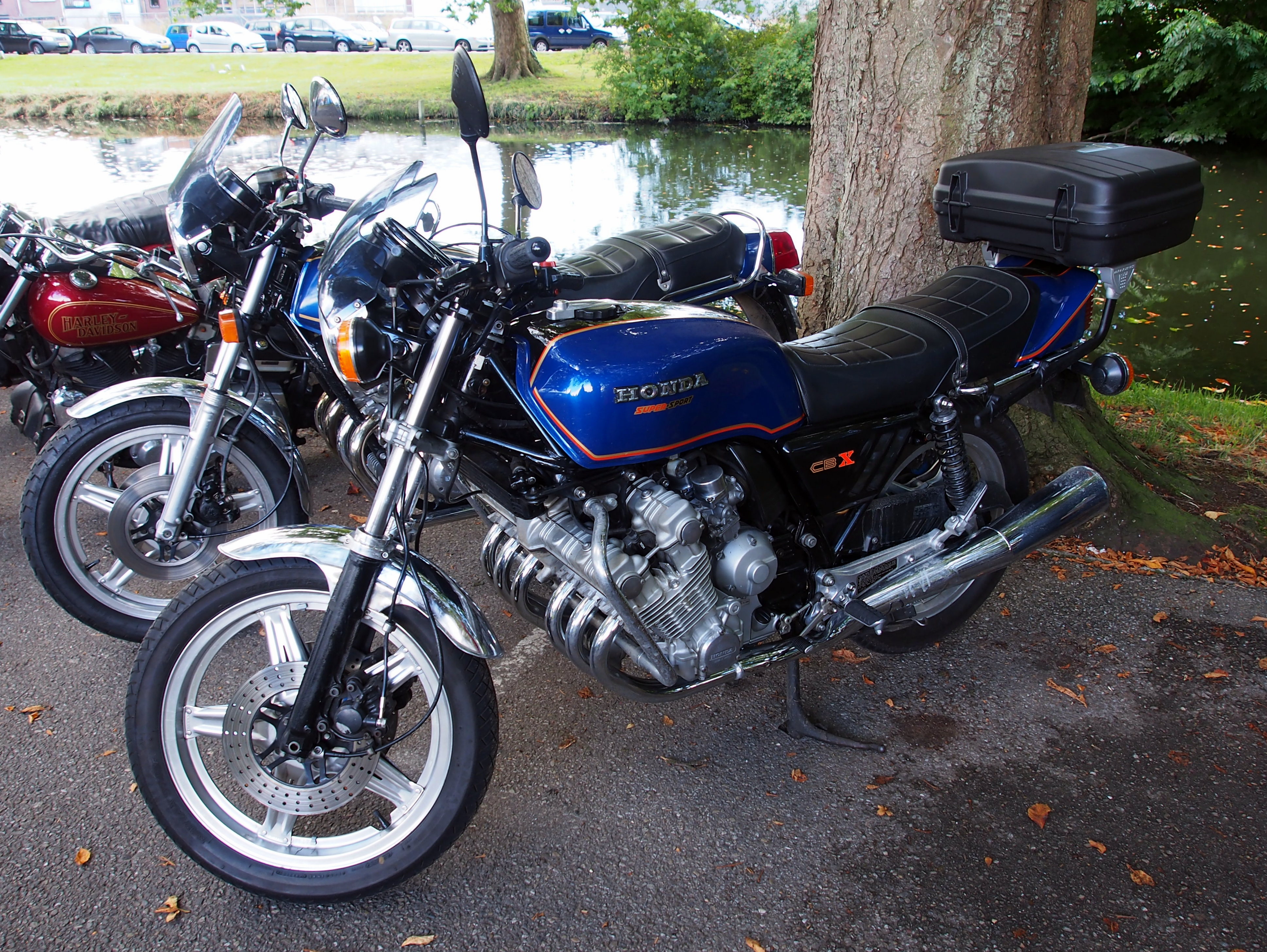 Blue Honda CBX Super Sport with its six-cylinder engine and exhaust headers visible
