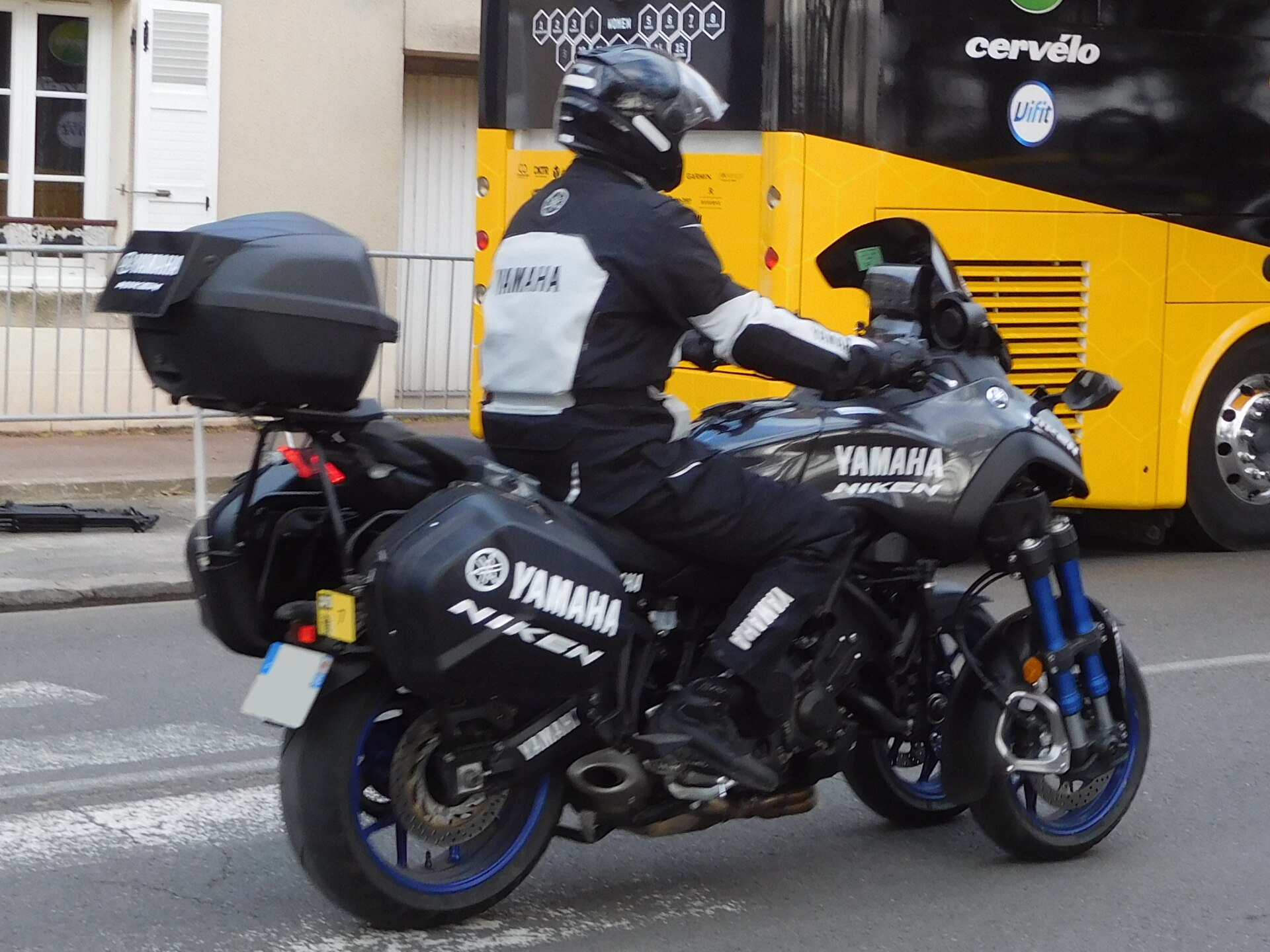 A rider on a Yamaha Niken at Paris–Nice in 2021.